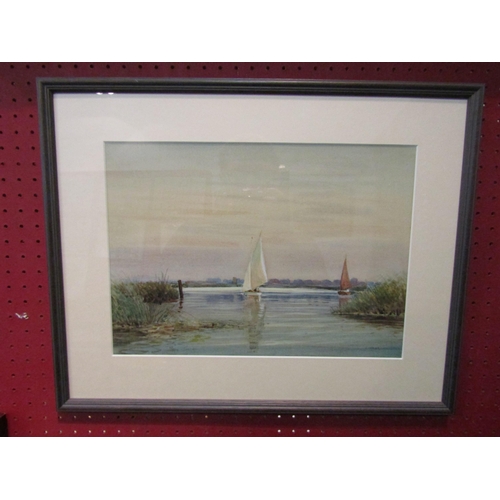 1059 - J.WEST (XX) A framed and glazed watercolour of a Broads scene. Signed bottom right. Image size 26cm ... 