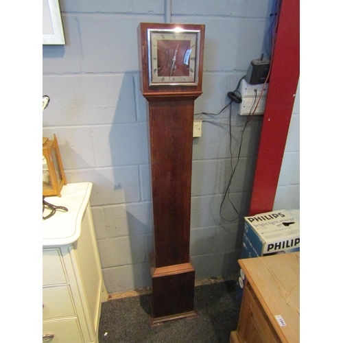 1084 - An early 20th Century grandmother clock with Westminster chimes, with key and pendulum, 134cm tall