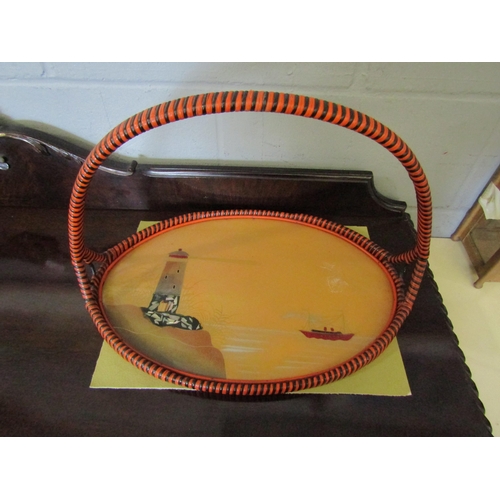 1095 - A retro oval tray with overhead handle, the centre decorated with lighthouse and ship, 47cm long x 3... 