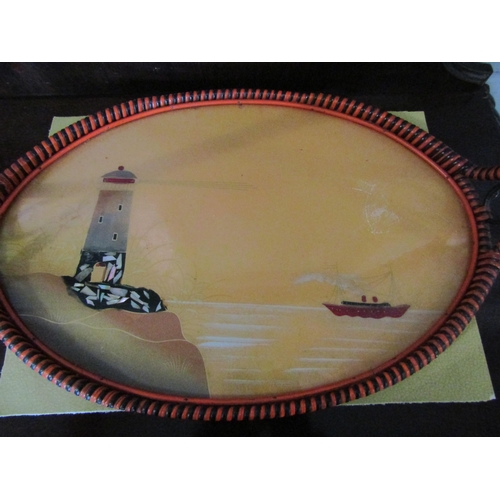 1095 - A retro oval tray with overhead handle, the centre decorated with lighthouse and ship, 47cm long x 3... 