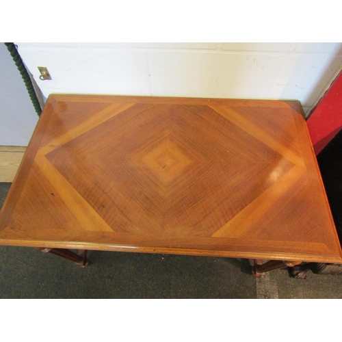 1102 - A French walnut side table, concealed single frieze drawer, on turned and reeded supports, stretcher... 