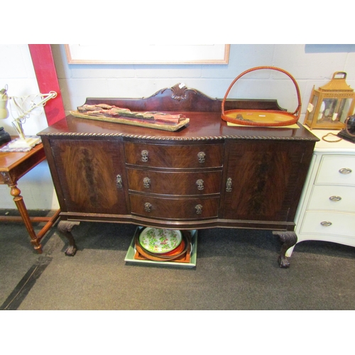 1104 - A Georgian mahogany extending dining table retailed by 