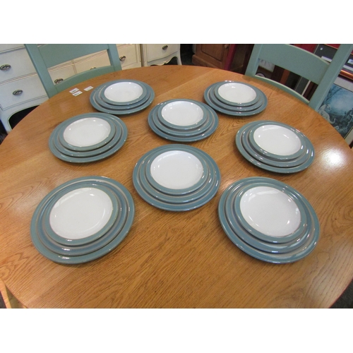 1105 - A quantity of Denby blue rimmed table ware