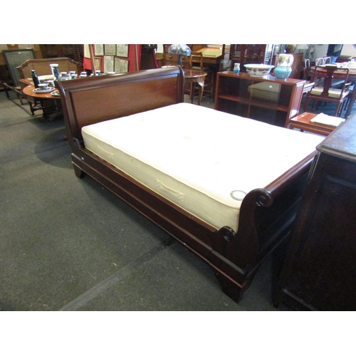 1108 - A mahogany sleigh bed with mattress, 102cm tall x 160cm wide x 230cm long