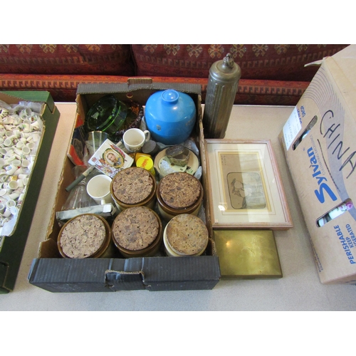 1161 - A box containing assorted items including T.G Green storage jars, brass flask, cigarette box, Royal ... 