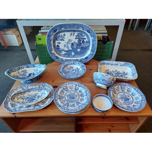 1221 - A collection of mainly Spode blue and white transfer ware ceramics; meat plate, footed comport, etc