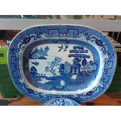 1221 - A collection of mainly Spode blue and white transfer ware ceramics; meat plate, footed comport, etc