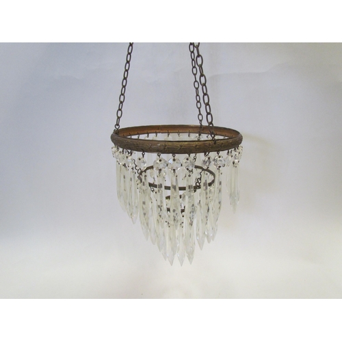 1294 - A three tier crystal bag chandelier