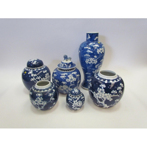 1299 - Five Chinese blue and white ginger jars and a Chinese prunus blue and white vase and cover (characte... 