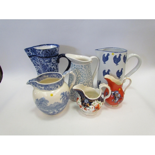 1301 - Six Victorian and later decorative jugs including Doulton and Spode