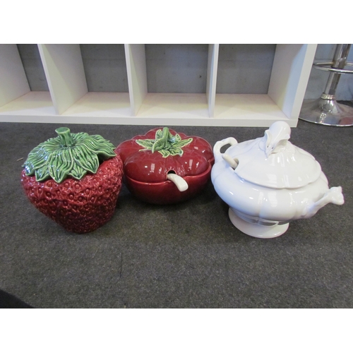 1310 - Three soup tureens including strawberry form example, two with ladles