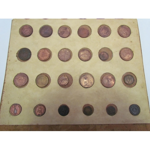 1313 - Two trays containing mainly British trading tokens from 17th - 19th Century, majority over cleaned  ... 