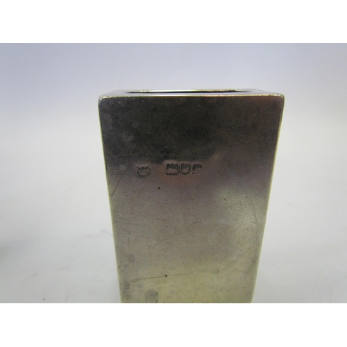 1315 - A silver card case, engine turned and monogrammed, a silver match box holder with figural scene and ... 