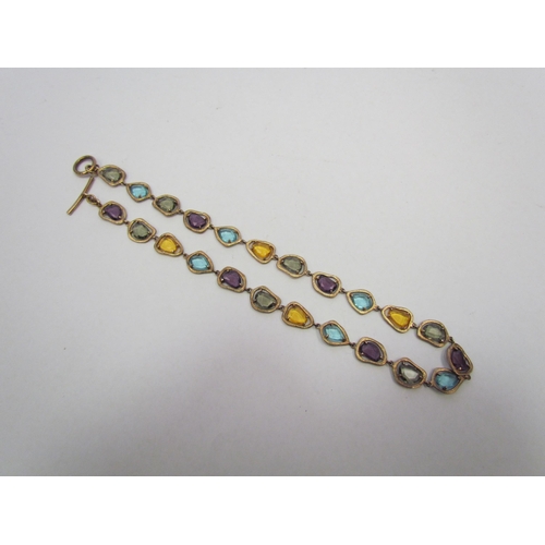 1319 - An unusual silver gilt gem set necklace