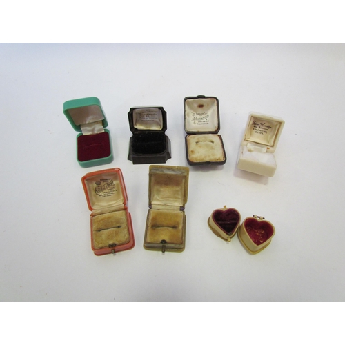 1352 - Seven bakelite and early plastic ring boxes, the heart form example a/f