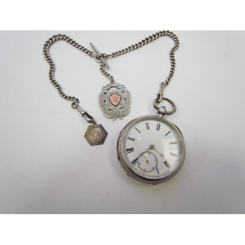 1366 - A gents silver pocket watch on silver Albert chain with fob