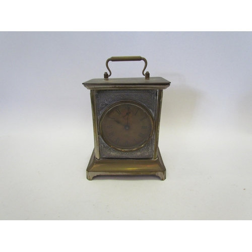 1373 - A brass carriage clock, 14.5cm tall