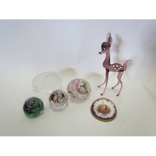 1376 - Five glass paperweight including a Mats Jonasson Swedish example and a glass figure of deer (6)