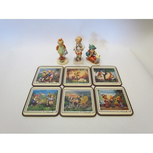 1377 - Three boxed Hummel Goebel figures and a boxed set of six hummel coasters