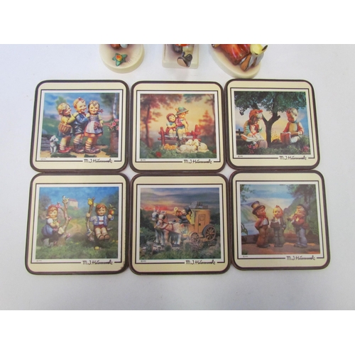 1377 - Three boxed Hummel Goebel figures and a boxed set of six hummel coasters