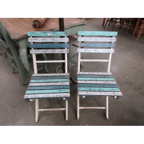 2187 - A pair of painted folding cafe chairs       (R) £15