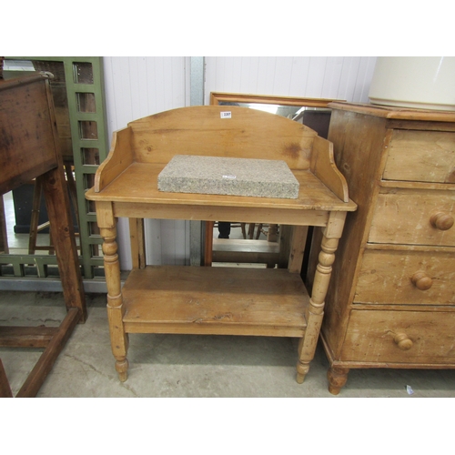 2207 - A Victorian waxed pine two tier washstand