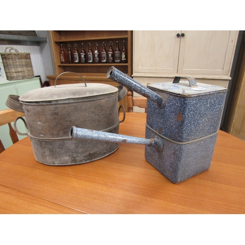 2226 - A metal saucepan and drainer and an enamel set