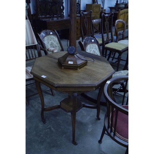 2145 - An Edwardian inlaid mahogany two tier occasional table