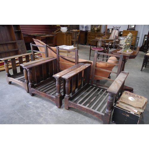 2153 - Three 1920's oak recliner chairs in the manner of Heals