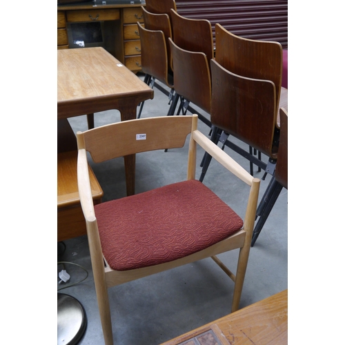 2307 - A pair of GFM stripped teak elbow chairs