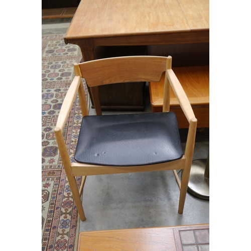 2307 - A pair of GFM stripped teak elbow chairs