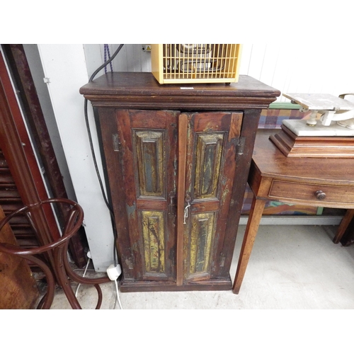 2055 - An Indian painted hardwood two door cupboard