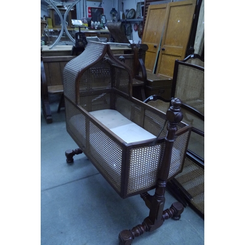 2010 - An early Victorian mahogany canework nursery rocking crib a/f   (E) £20-30