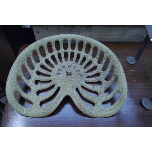 2022 - A cast iron Hornsby tractor seat