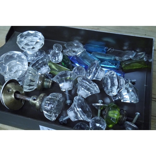 2047 - A tray of glass knobs       (R) £0