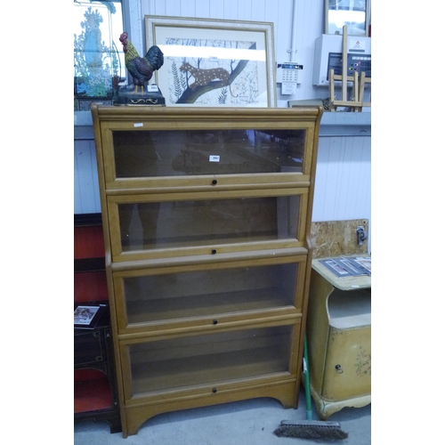 2061 - A 1960's light beechwood glazed bookcase