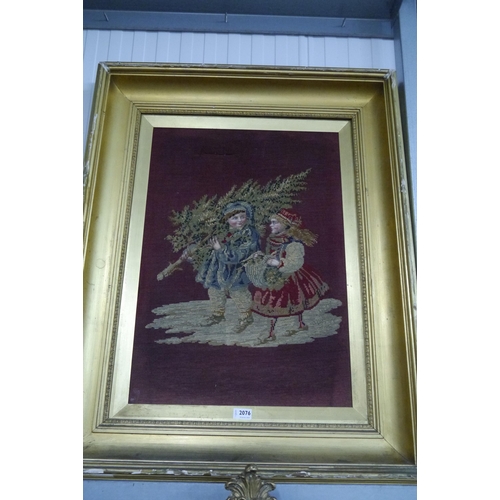 2076 - A Victorian gilt framed needle point, collecting the Christmas tree