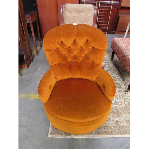 2238 - A Victorian fireside chair, orange upholstery