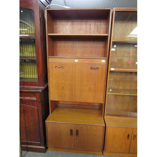 2247 - A retro G-plan teak drinks unit with shelves, cupboards abd pull down mirrored drinks area