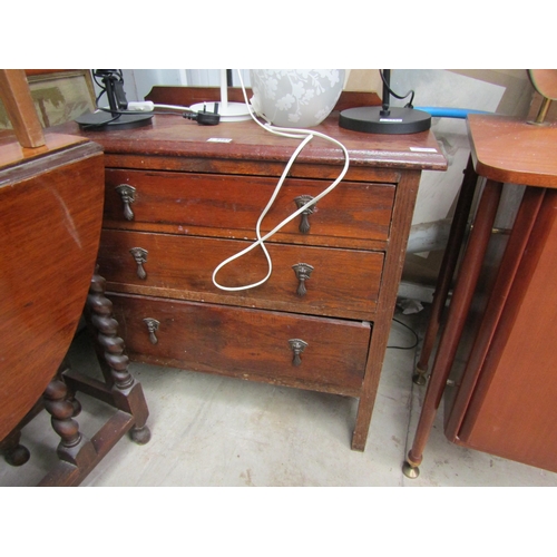 2289 - A 1930's oak chest of three drawers