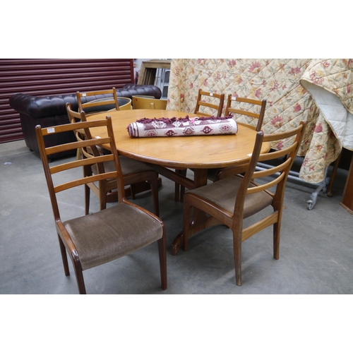 2312 - A G-Plan teak extending dining table and six chair frames