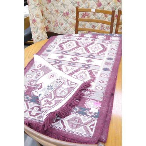 2313 - A pair of small geometric rugs        (E) £8-12