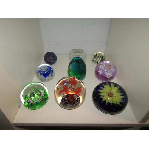 1431 - A collection of glass paperweights including Caithness (18)