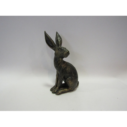 1435 - A bronzed effect figure of a seated hare, 25.5cm tall    (R) £10