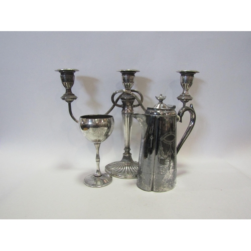 1455 - Three plated items, a three sconce candelabrum, goblet and a hot water jug