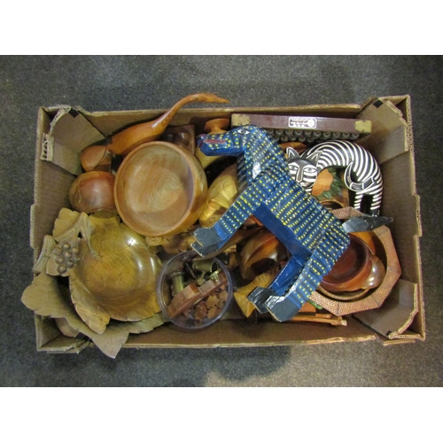 1462 - A box of mixed treen items including dishes, figures, animals etc.