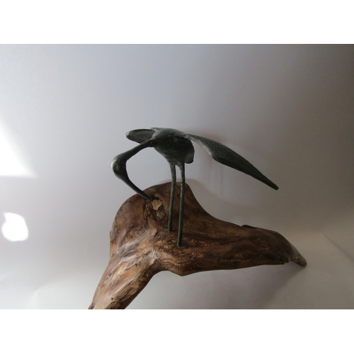 1511 - A studio piece bronze effect sculpture of Ibis stood on wooden base, 30cm tall