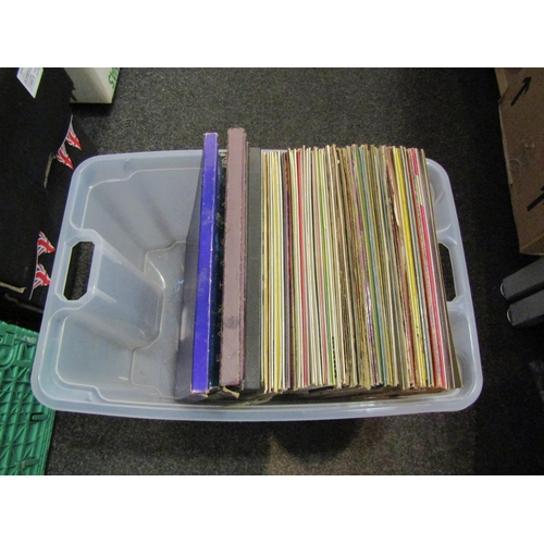 1525 - Two boxes of assorted vinyl LP records and a smaller number of 7