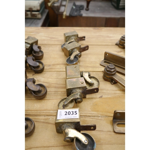 2035 - Five 19th Century brass table castors       (R) £15