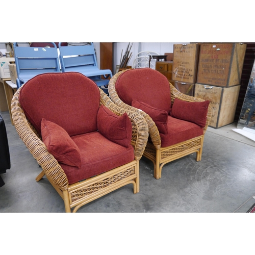 2260 - A pair of Wicker conservatory armchairs